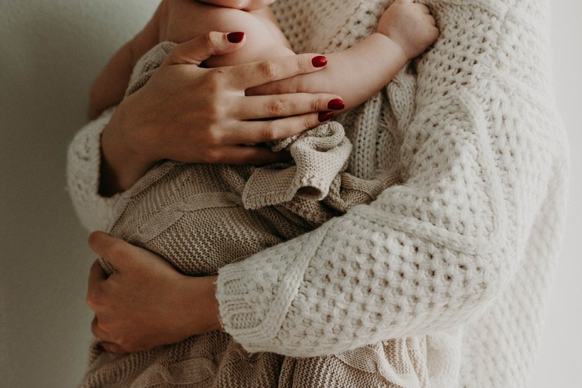 Mother holding a baby